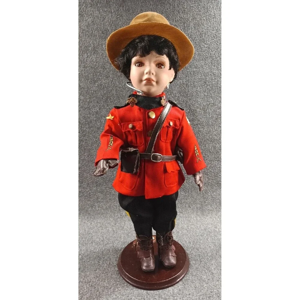 RCMP Country Canadian Mountie Porcelain Doll With Wood Based Stand